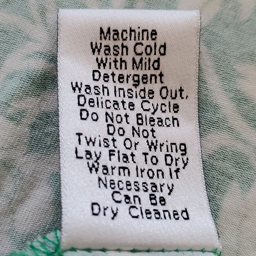 Green and white Cabi faux wrap dress. - Picture 4 of 5